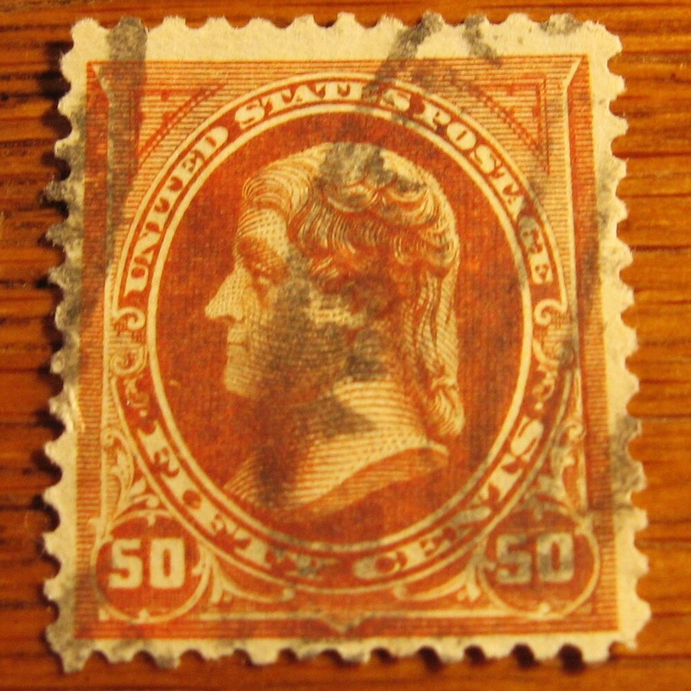 1894 Thomas Jefferson 50 cent stamp with triangles in upper corners
